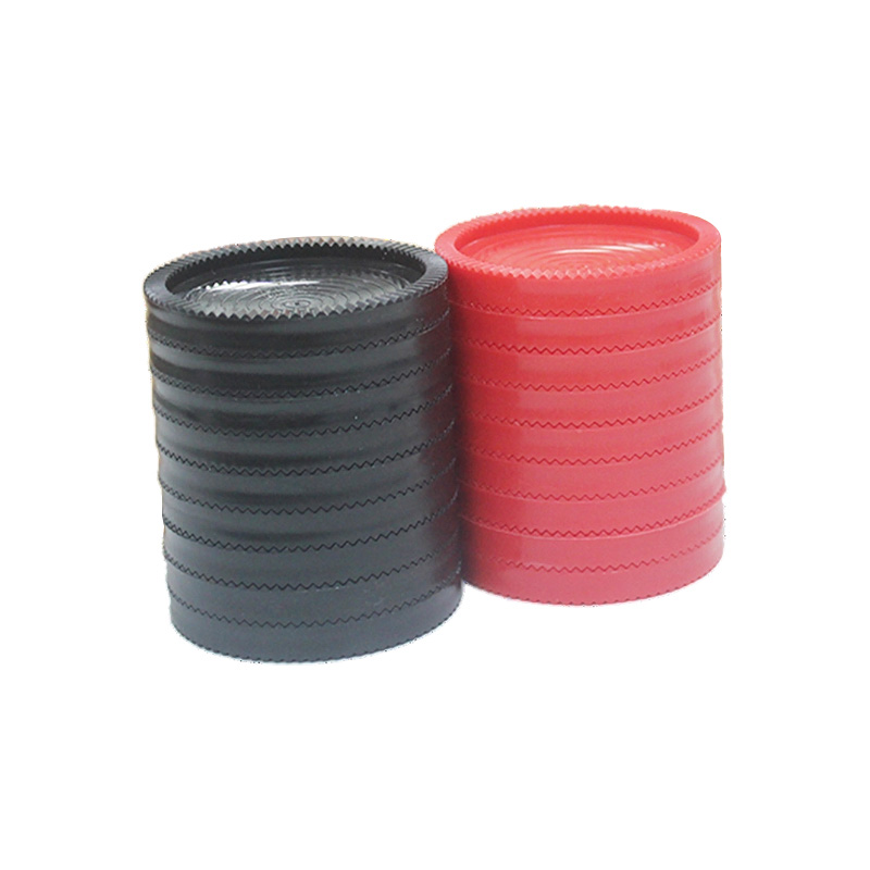 Red and black plastic checkers chess pieces