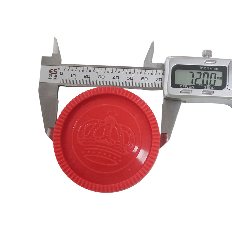 Red and black plastic checkers chess pieces