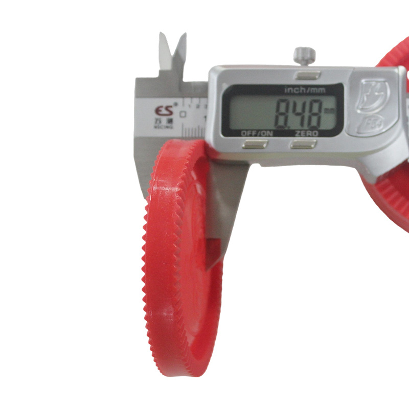 Red and black plastic checkers chess pieces