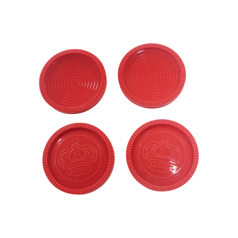 Red and black plastic checkers chess pieces