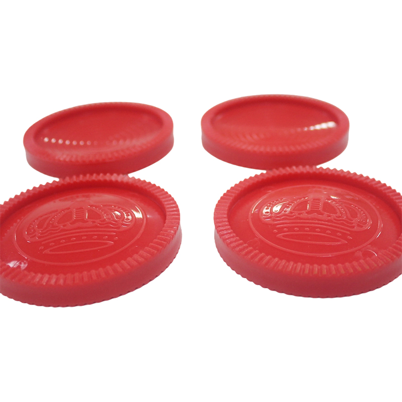 Red and black plastic checkers chess pieces